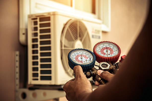 Professional Air Conditioning Service technician working in Center Hill, FL